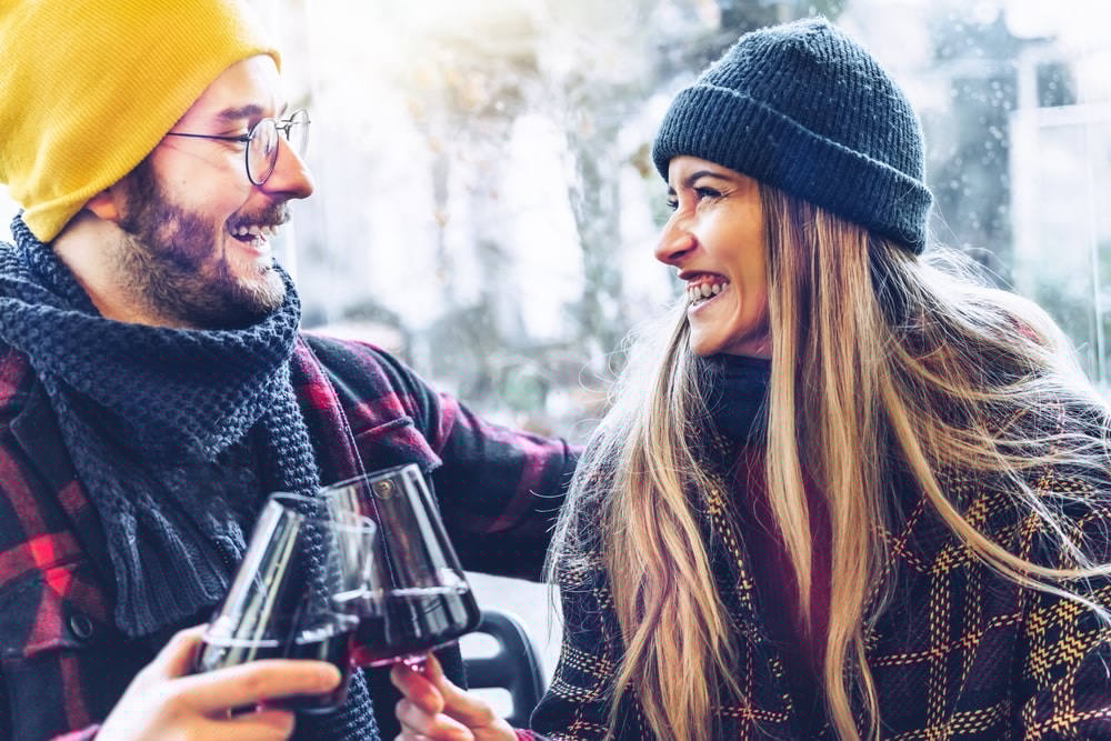 Bed and Breakfast in Mystic, CT, for romantic getaways, happy couple enjoying a glass of wine